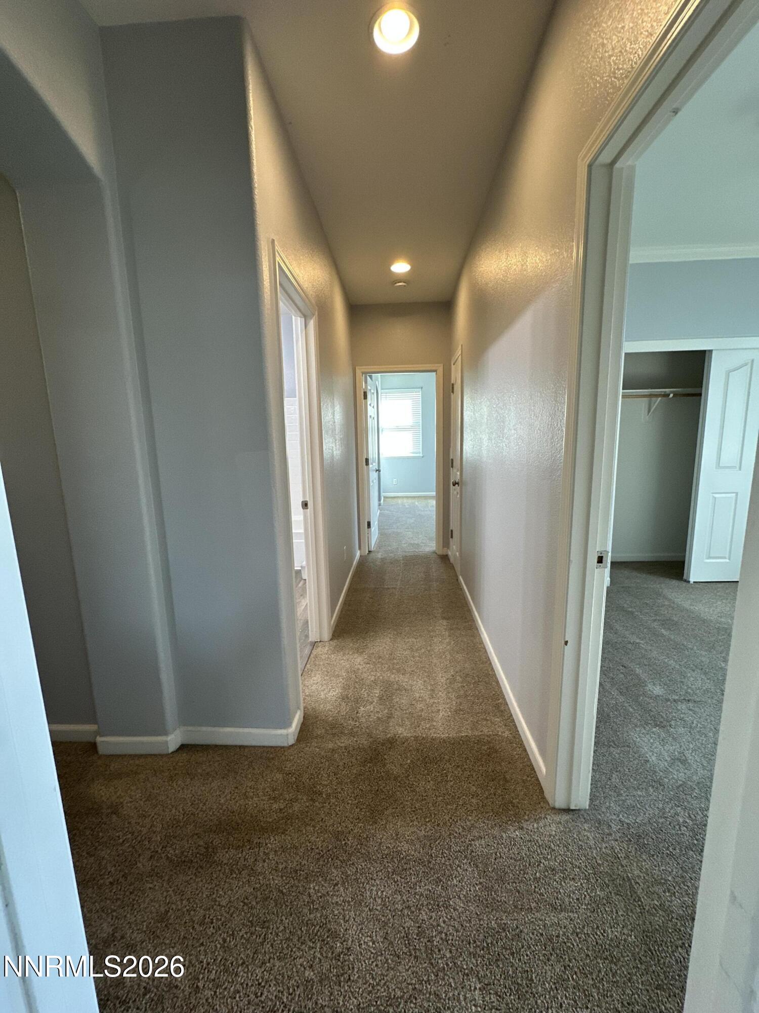 11201 Messina Way Reno, NV 89521 - Photo 16 of 27 Upstair Hallway and Bedroom 3