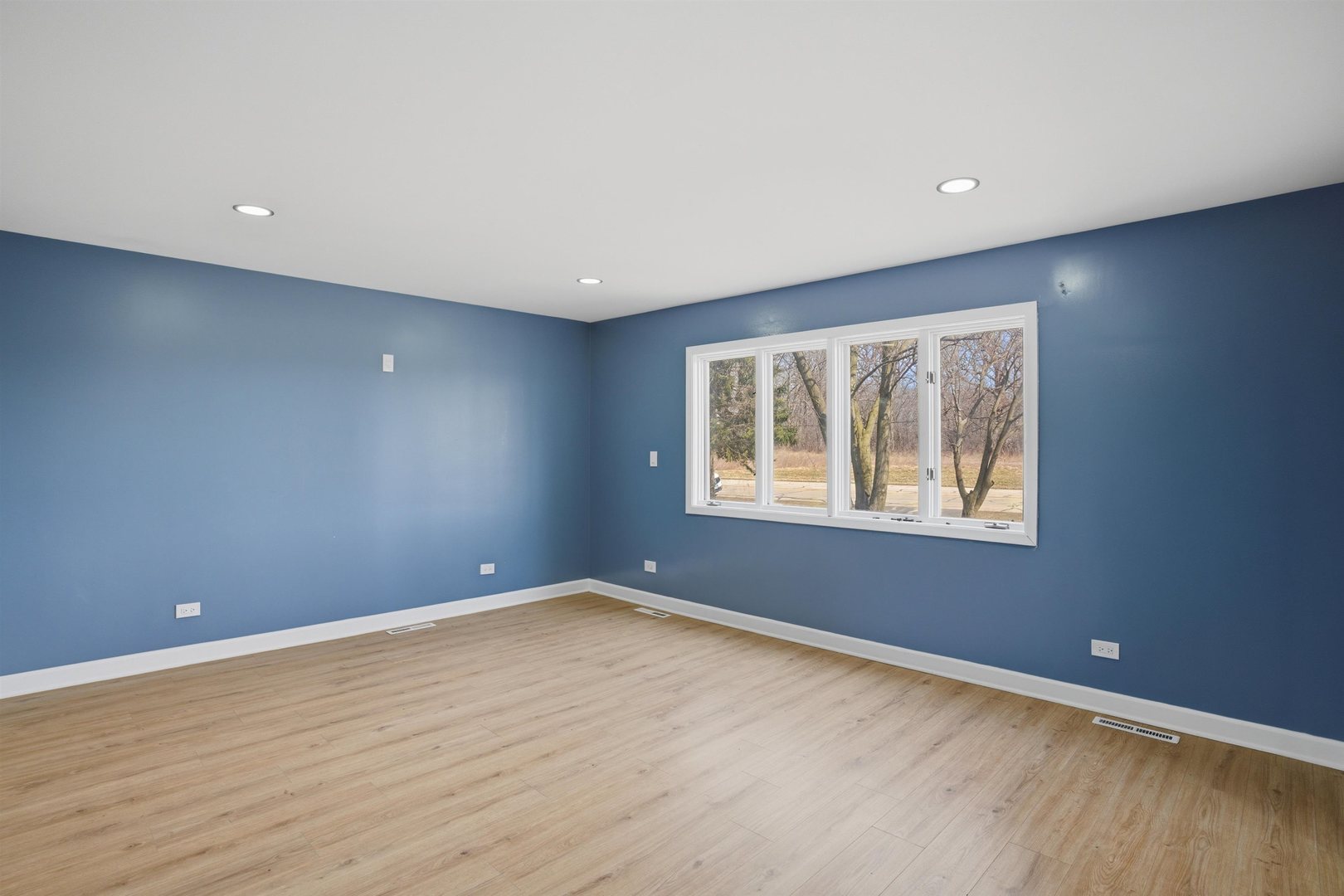 17N620 Ketchum Road Hampshire, IL 60140 - Photo 39 of 50 an empty room with wooden floor and windows