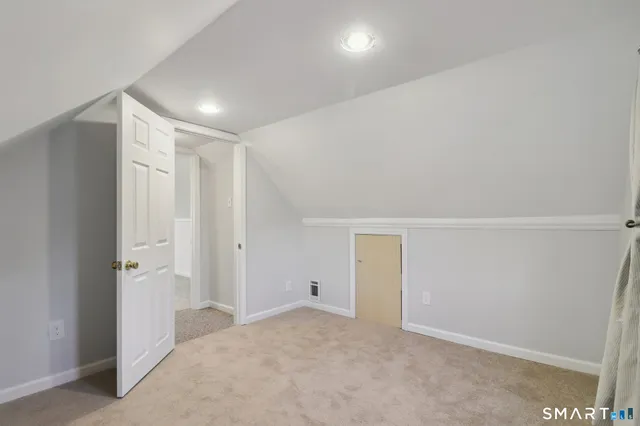 an empty room with an entryway