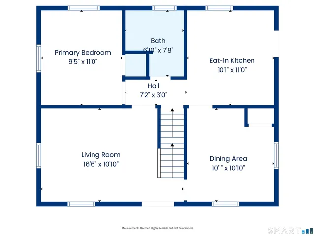 a picture of a wall with a white building