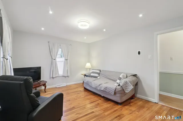 a living room with furniture and a couch