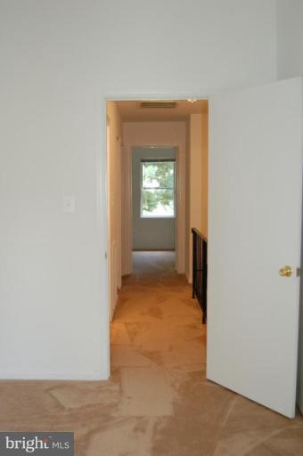 69 Kinsman View Circle Silver Spring, MD 20901 - Photo 10 of 12 a view of an empty room with window