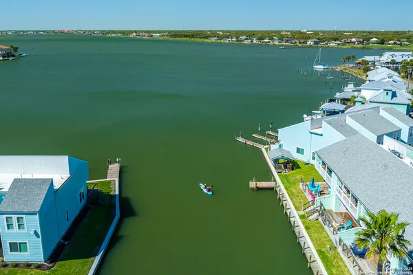 an aerial view of a city with houses