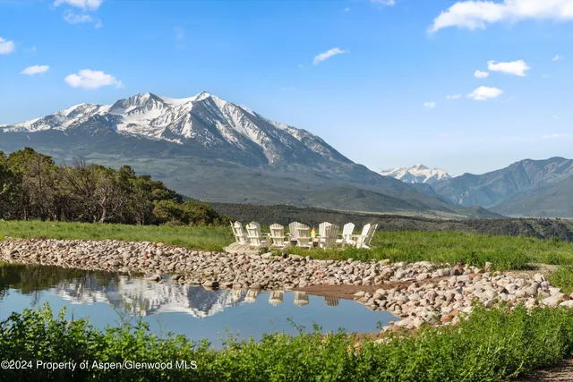 a view of a lake with a mountain in the background