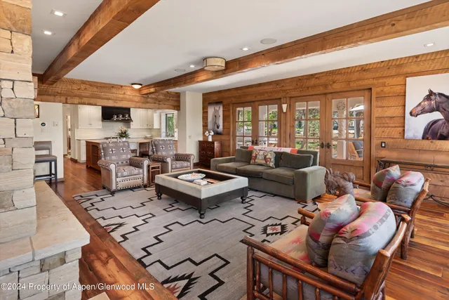a bathroom with a double vanity sink mirror and shower