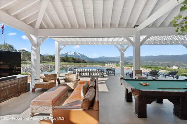 a kitchen with a sink and refrigerator