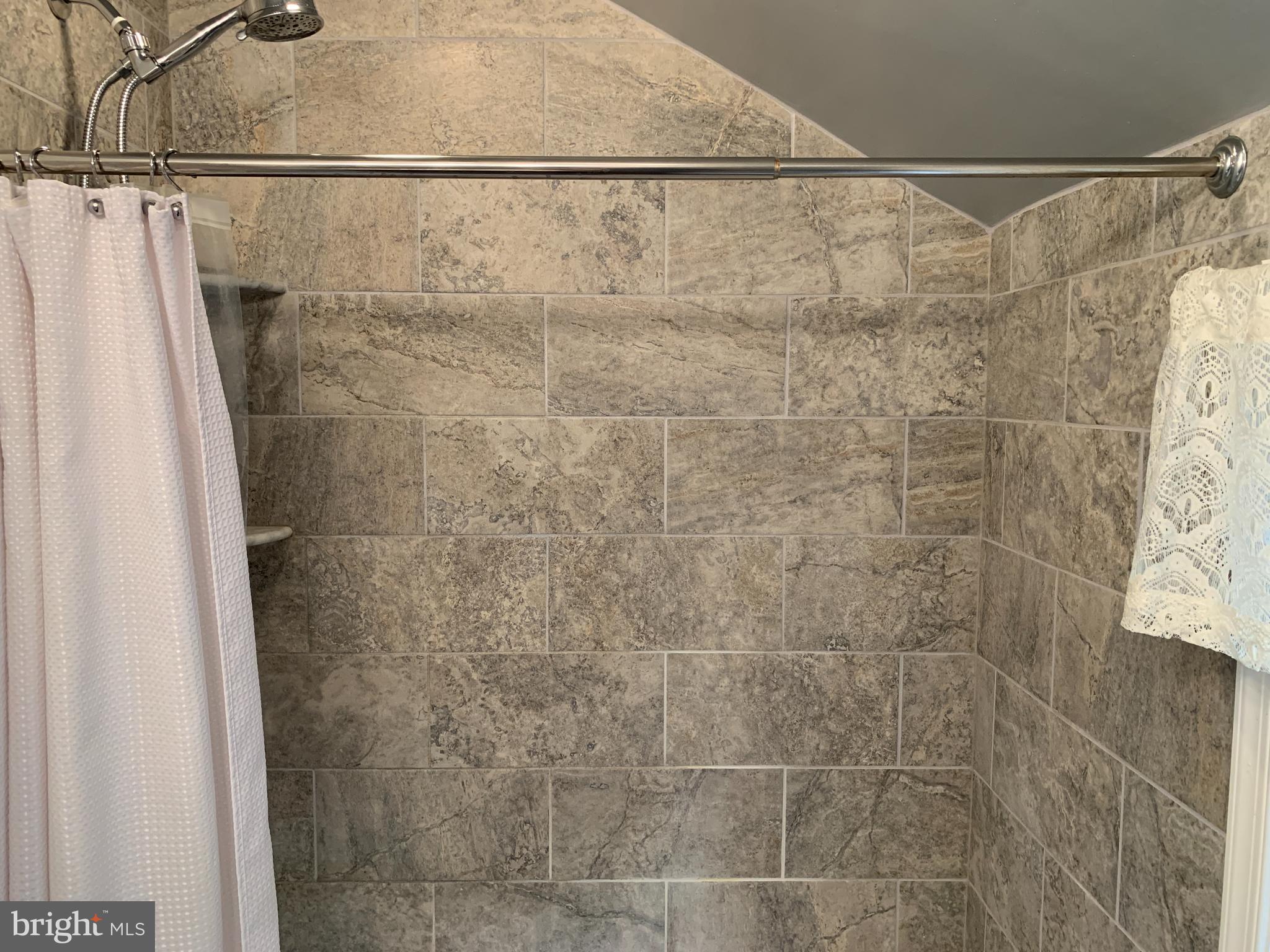 124 Rambling Way Springfield, PA 19064 - Photo 24 of 35 Ceramic Tile Tub/shower combo