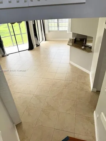 a view of a bathroom with a sink and a bath tub