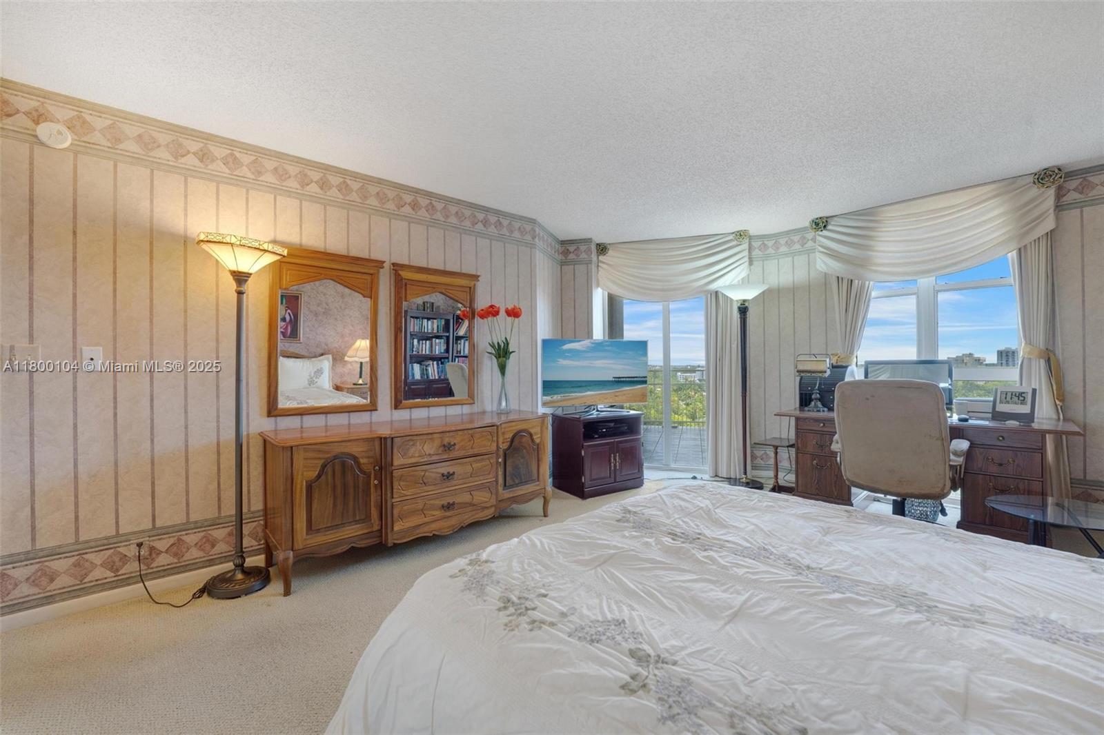 4000 Towerside Terrace, Unit 1403 Miami, FL 33138 - Photo 14 of 59 a bedroom with furniture and window