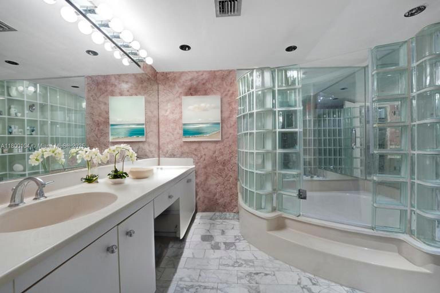4000 Towerside Terrace, Unit 1403 Miami, FL 33138 - Photo 15 of 59 a bathroom with a double vanity sink mirror and shower