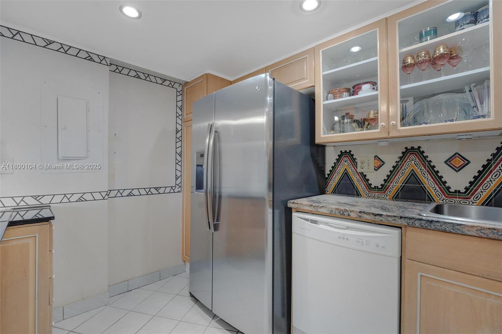 4000 Towerside Terrace, Unit 1403 Miami, FL 33138 - Photo 20 of 59 a view of a refrigerator in kitchen