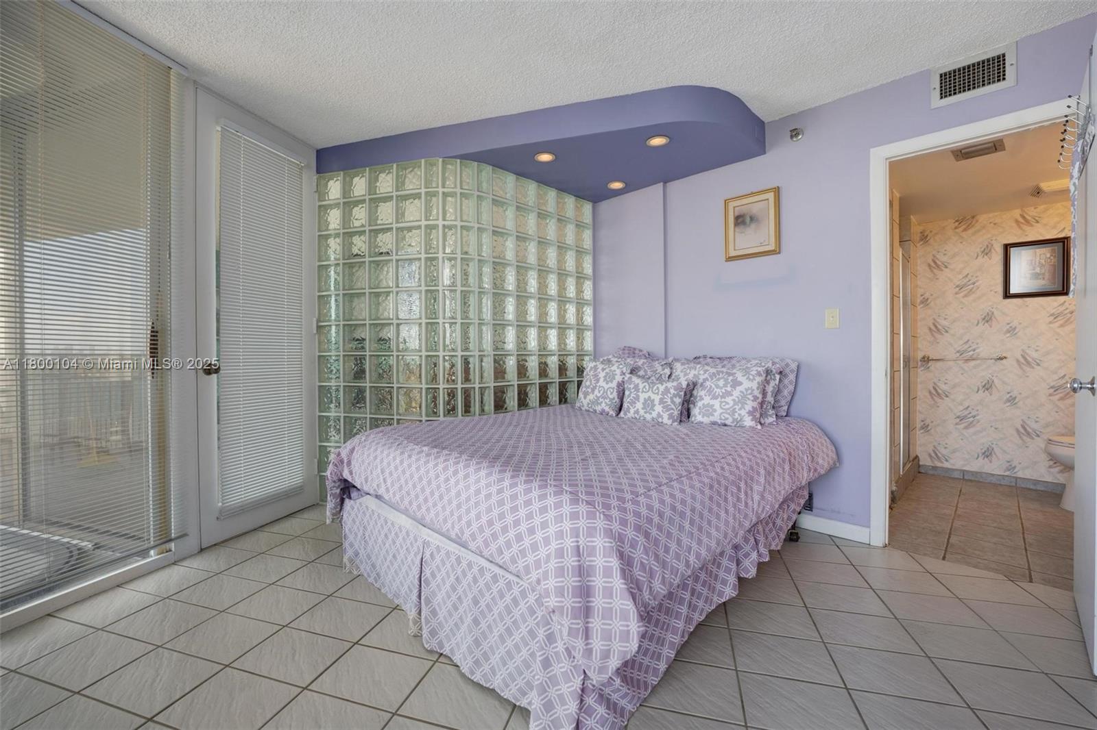 4000 Towerside Terrace, Unit 1403 Miami, FL 33138 - Photo 26 of 59 a bedroom with a bed and a shower