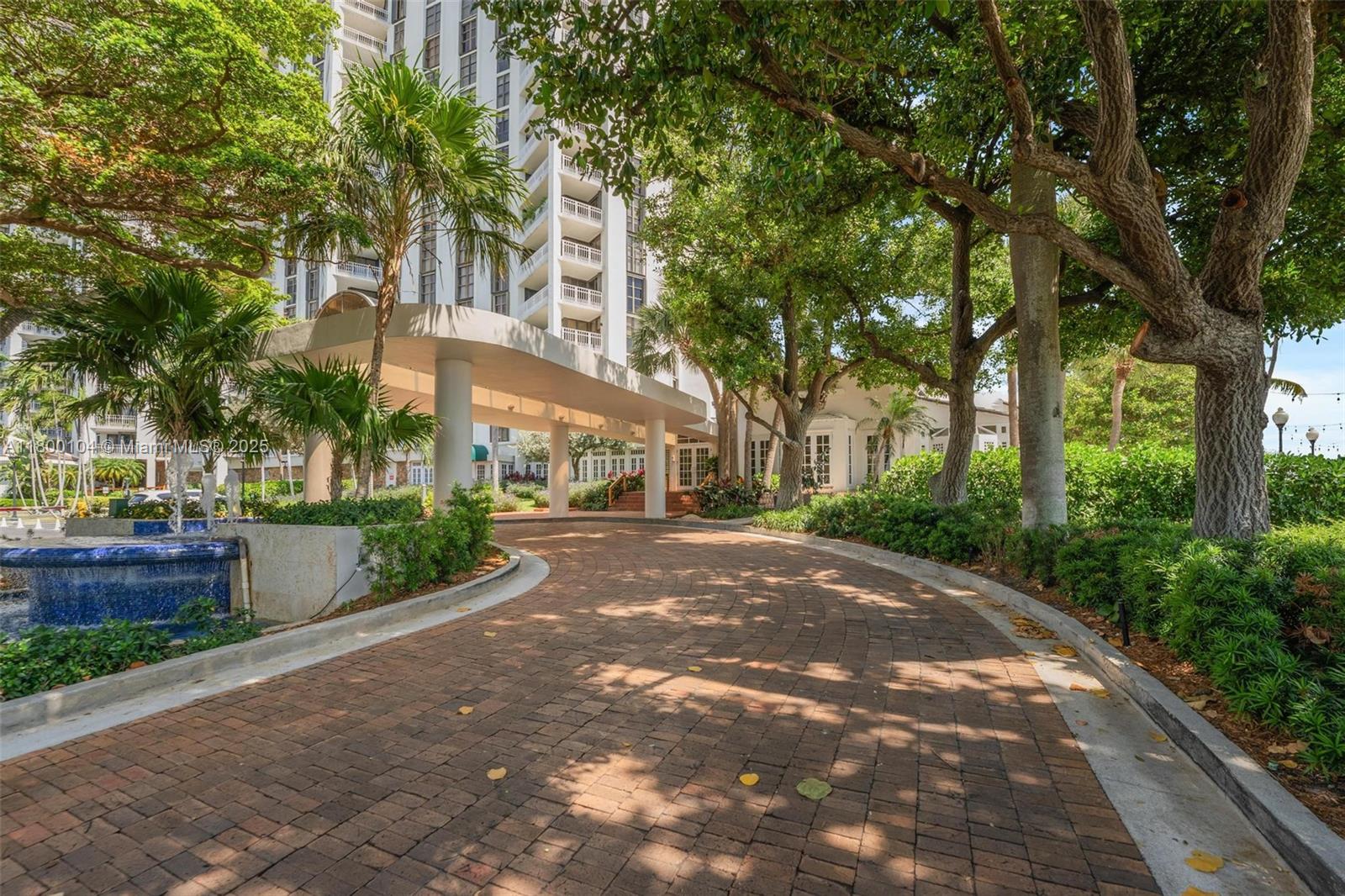 4000 Towerside Terrace, Unit 1403 Miami, FL 33138 - Photo 31 of 59 a view of a building with a yard