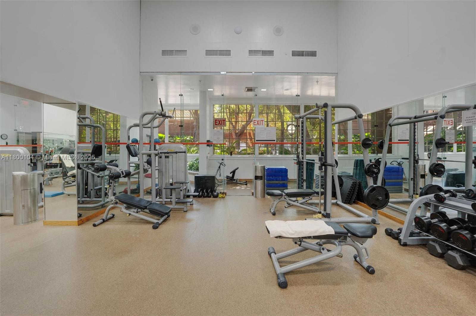 4000 Towerside Terrace, Unit 1403 Miami, FL 33138 - Photo 36 of 59 a room with gym equipment and a large window