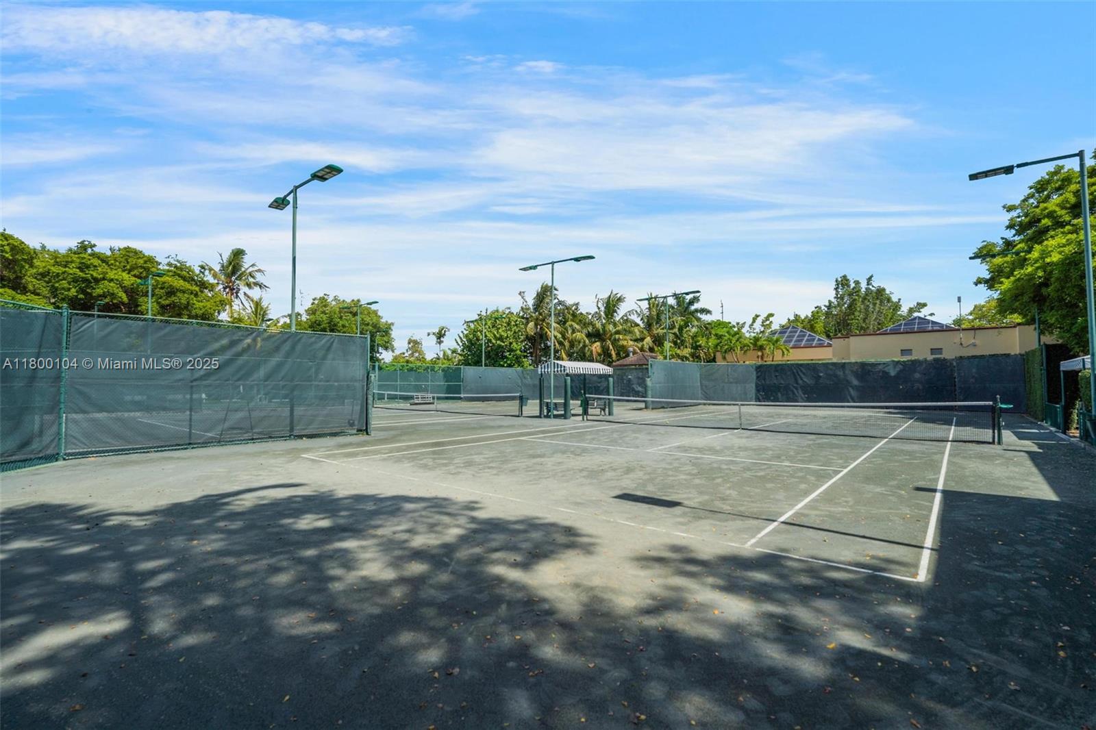 4000 Towerside Terrace, Unit 1403 Miami, FL 33138 - Photo 39 of 59 a view of a tennis court