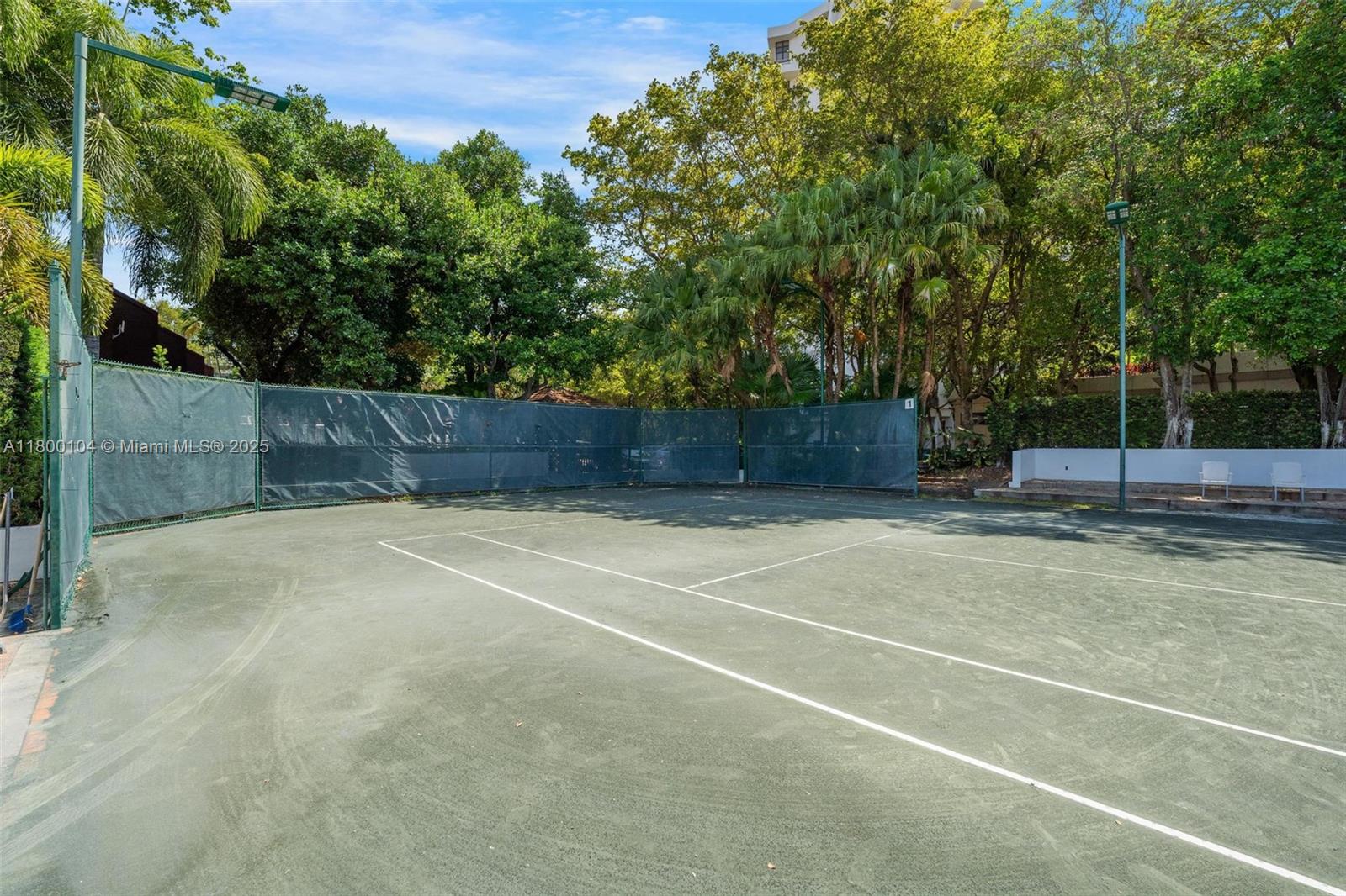 4000 Towerside Terrace, Unit 1403 Miami, FL 33138 - Photo 40 of 59 a view of a tennis court