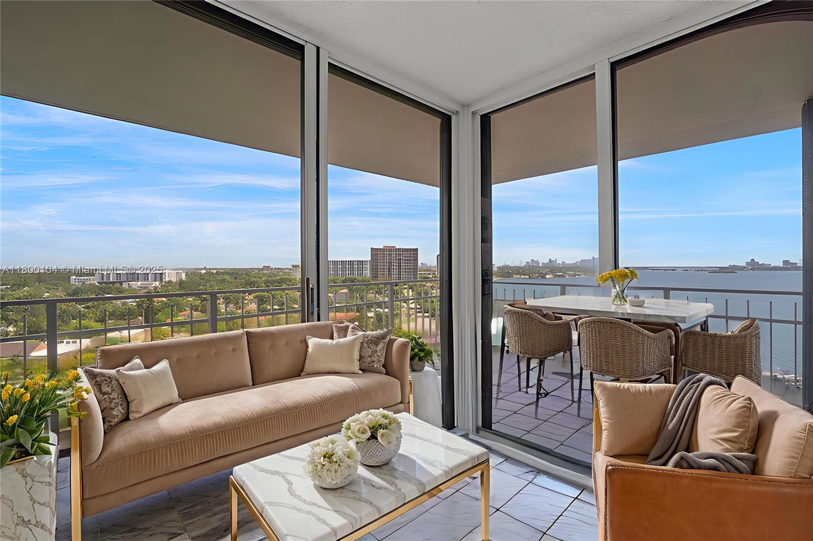 4000 Towerside Terrace, Unit 1403 Miami, FL 33138 - Photo 4 of 59 a living room with furniture city view and large windows