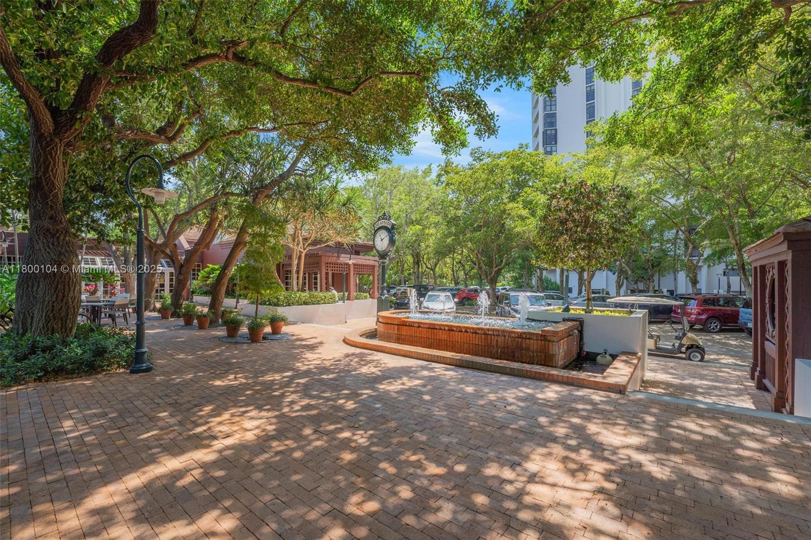 4000 Towerside Terrace, Unit 1403 Miami, FL 33138 - Photo 43 of 59 a view of a outdoor space with a sitting area