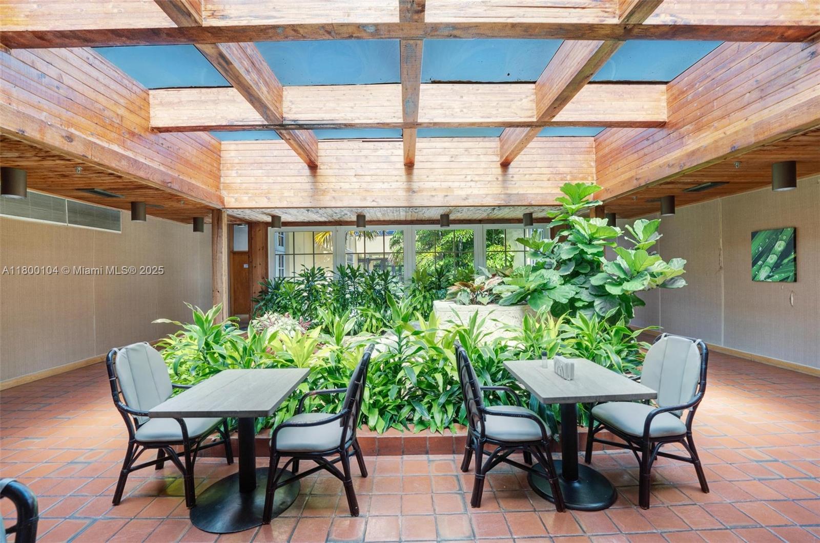 4000 Towerside Terrace, Unit 1403 Miami, FL 33138 - Photo 46 of 59 a view of outdoor seating area with furniture