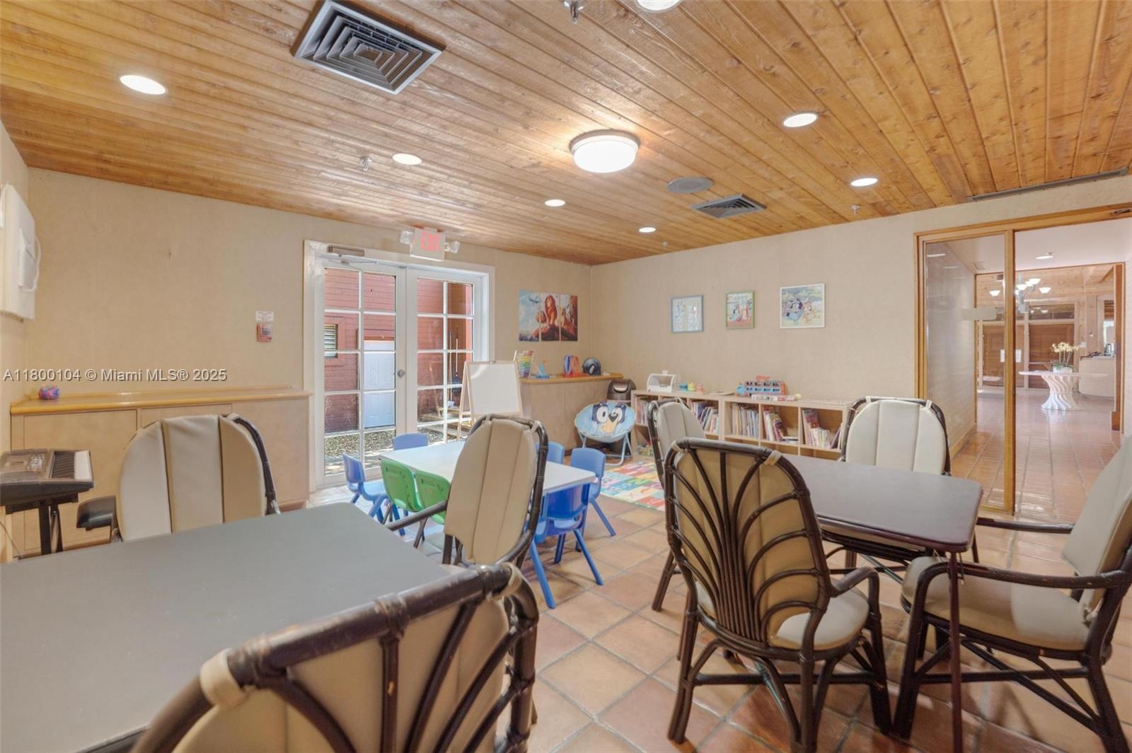 4000 Towerside Terrace, Unit 1403 Miami, FL 33138 - Photo 47 of 59 a view of a dining room with furniture