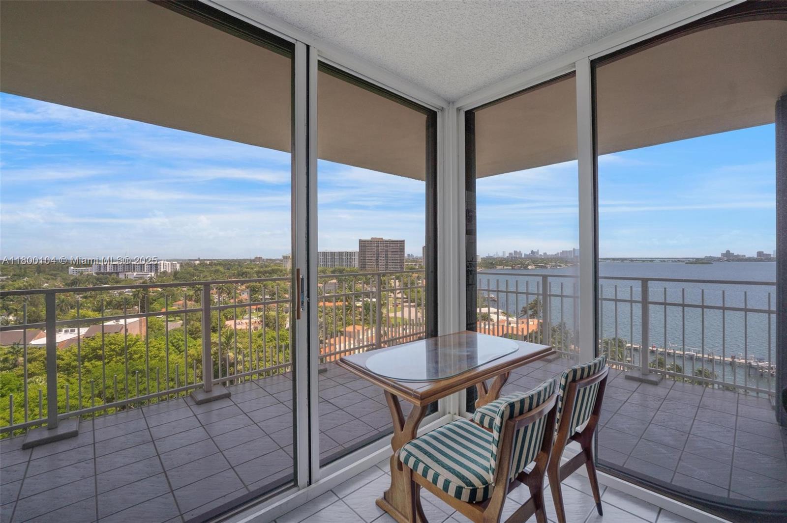 4000 Towerside Terrace, Unit 1403 Miami, FL 33138 - Photo 5 of 59 a view of a balcony with lake view and a ocean view