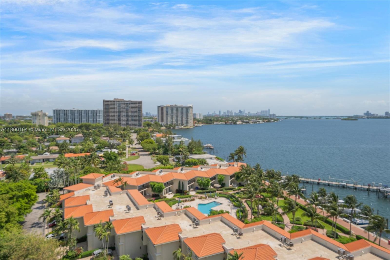4000 Towerside Terrace, Unit 1403 Miami, FL 33138 - Photo 54 of 59 an aerial view of a city with lots of residential buildings ocean and mountain view in back