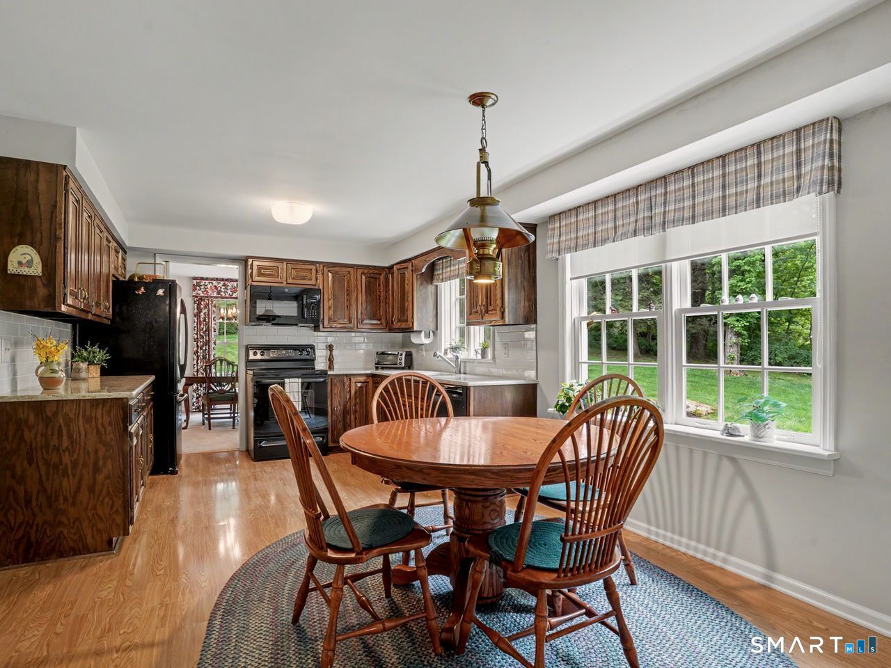86 Fire Hill Road Redding, CT 06896 - Photo 15 of 36 a dining room with furniture and window