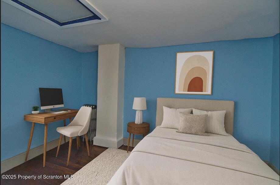 18 Pine Road Wilkes Barre, PA 18705 - Photo 16 of 32 a bedroom with a bed and a chair