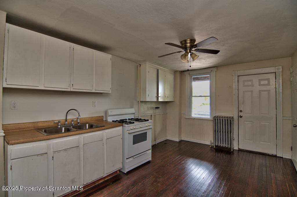 18 Pine Road Wilkes Barre, PA 18705 - Photo 23 of 33 a kitchen with stainless steel appliances granite countertop a sink a stove and cabinets