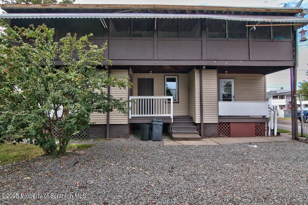 18 Pine Road Wilkes Barre, PA 18705 - Photo 3 of 32 a front view of a house with garden