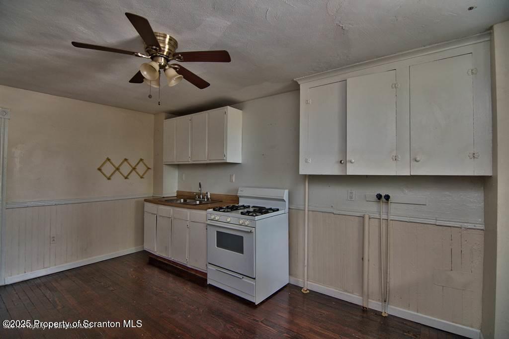 18 Pine Road Wilkes Barre, PA 18705 - Photo 10 of 32 a kitchen with stainless steel appliances granite countertop a stove a sink and a refrigerator