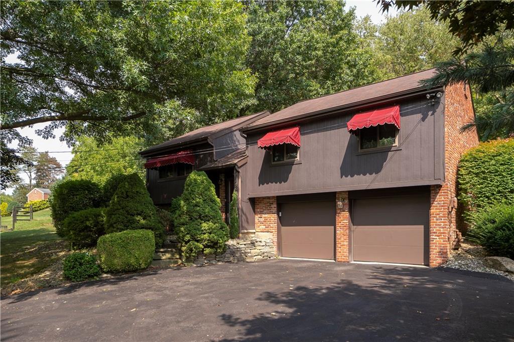 5896 Claridge Export Road Export, PA 15632 - Photo 2 of 25 Lovingly maintained! Plenty of parking for add'l cars and turn around! Oversized 2 car garage! Public water & sewage.