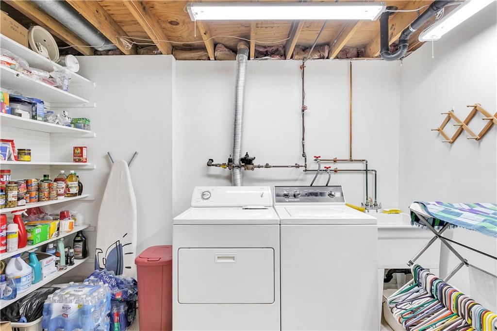 5896 Claridge Export Road Export, PA 15632 - Photo 21 of 25 Wow! Spacious laundry space with additional storage! Washer and Dryer included