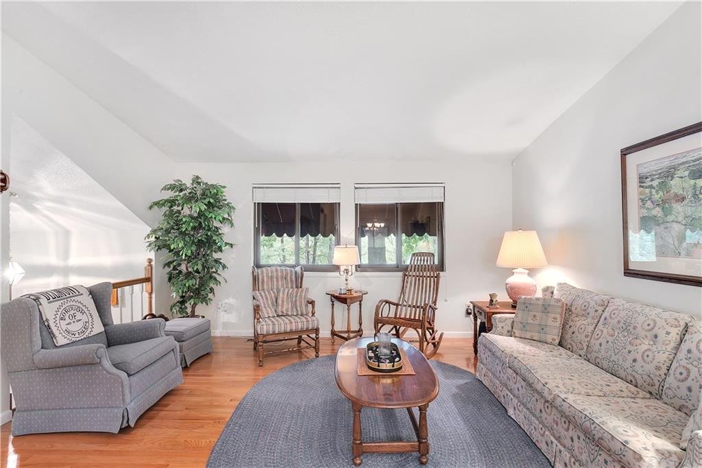 5896 Claridge Export Road Export, PA 15632 - Photo 7 of 25 Beautiful wood flooring compliments the Cozy living room