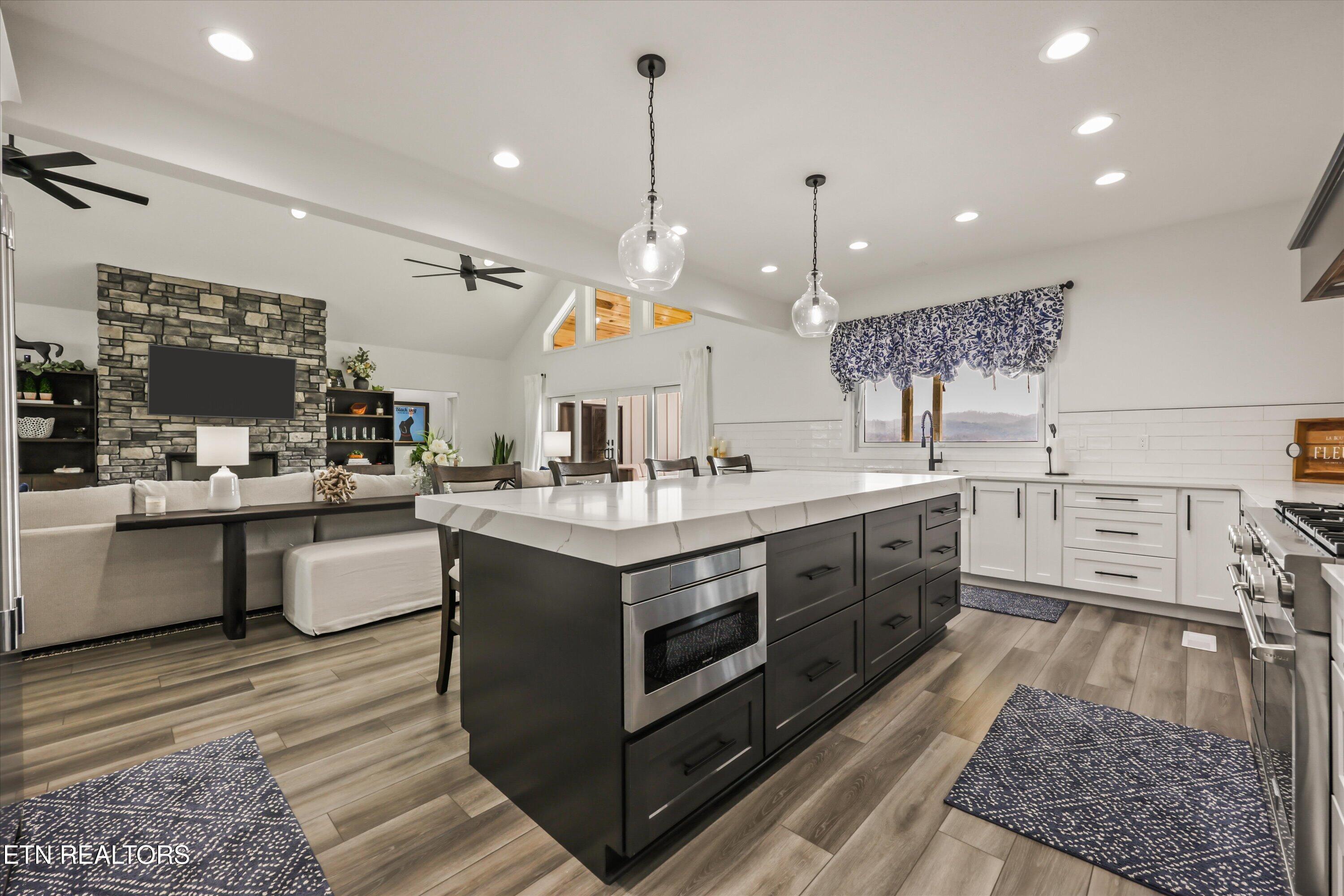 481 Masters Lane Bean Station, TN 37708 - Photo 7 of 58 Centerpiece island defines the space