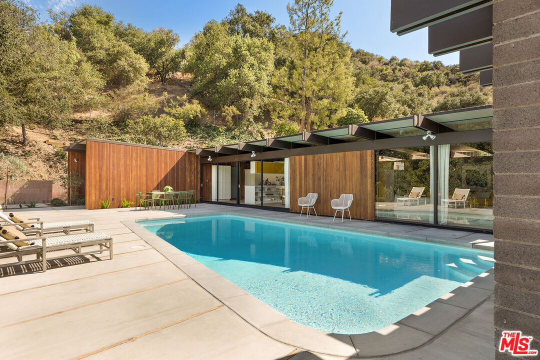 272 Mesa Lila Road Glendale, CA 91208 - Photo 16 of 46 a view of a house with backyard porch and sitting area