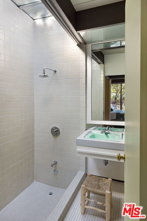 272 Mesa Lila Road Glendale, CA 91208 - Photo 27 of 46 a bathroom with a sink toilet and shower