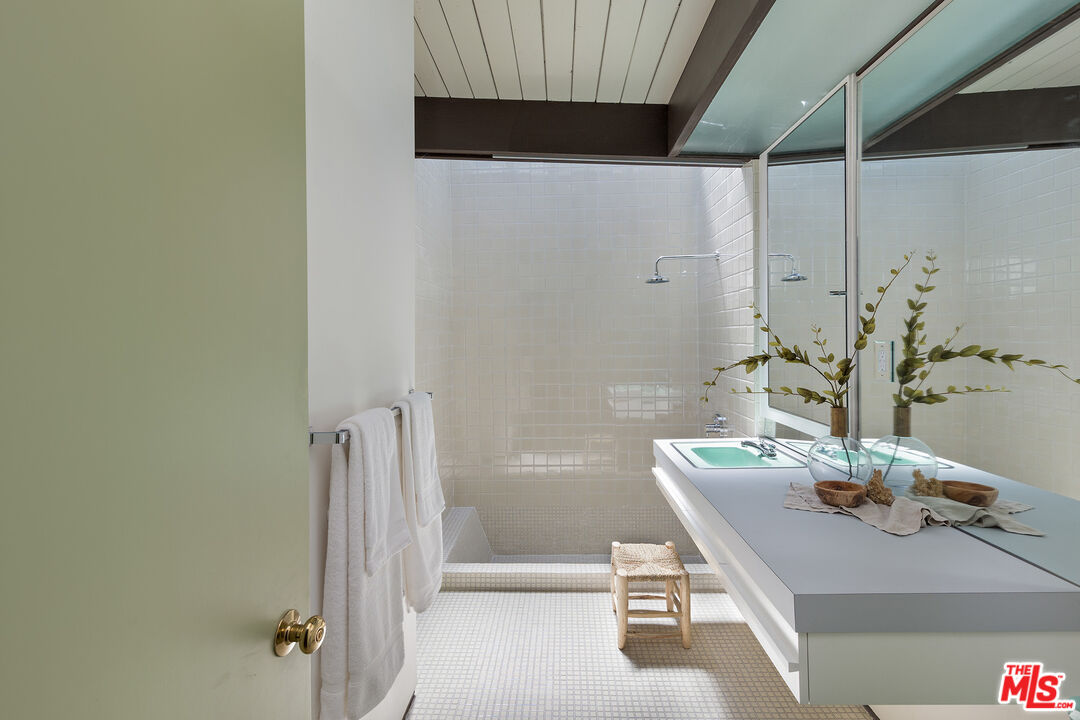 272 Mesa Lila Road Glendale, CA 91208 - Photo 28 of 46 a bathroom with a sink and a shower