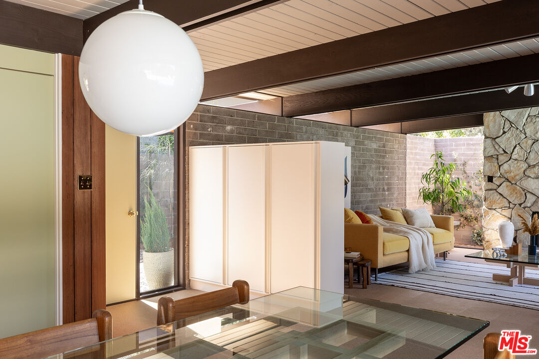 272 Mesa Lila Road Glendale, CA 91208 - Photo 5 of 46 a very nice looking room with a large window and a chandelier