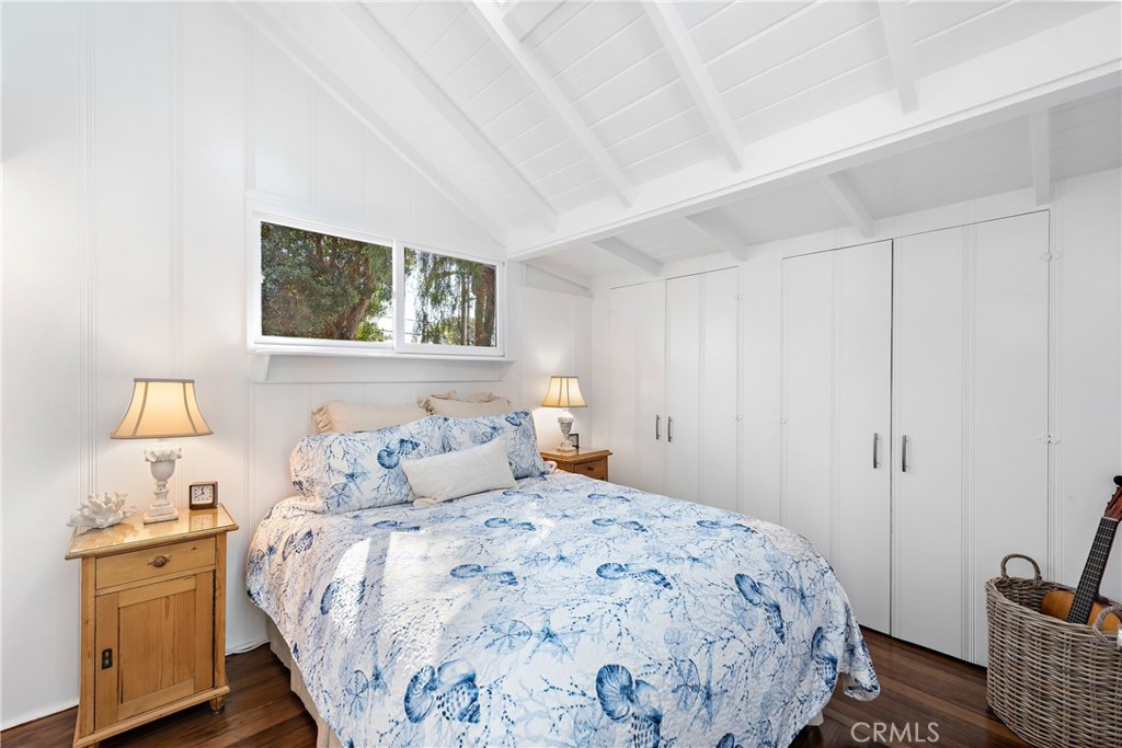 31521 Summit Road Laguna Beach, CA 92651 - Photo 13 of 21 Bedroom in the main cottage with wood floors, high pitched beamed ceilings, and ample closet space.