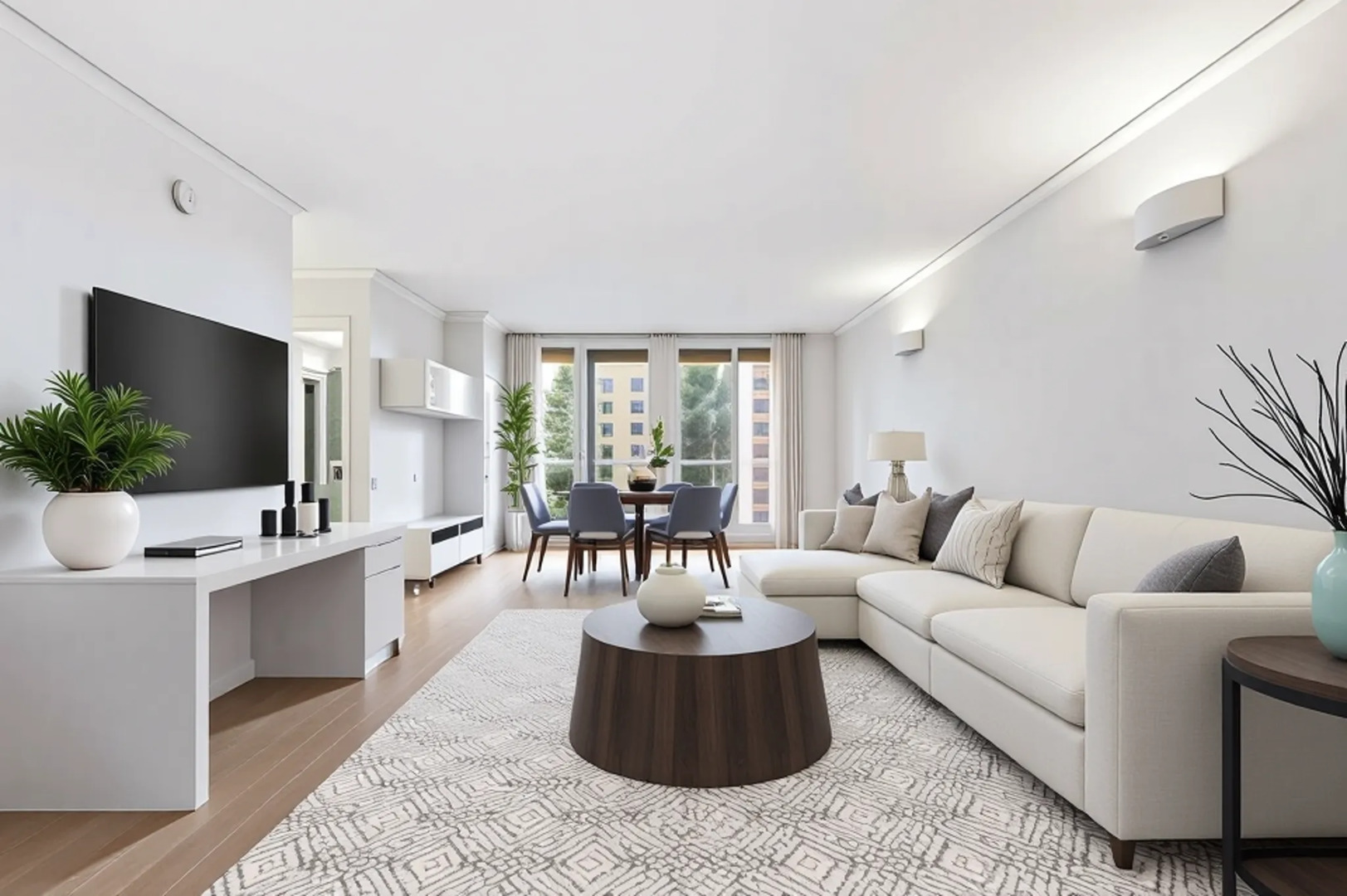 420 East Waterside Drive, Unit 1502 Chicago, IL 60601 - Photo 2 of 11 a living room with furniture a flat screen tv and a large window