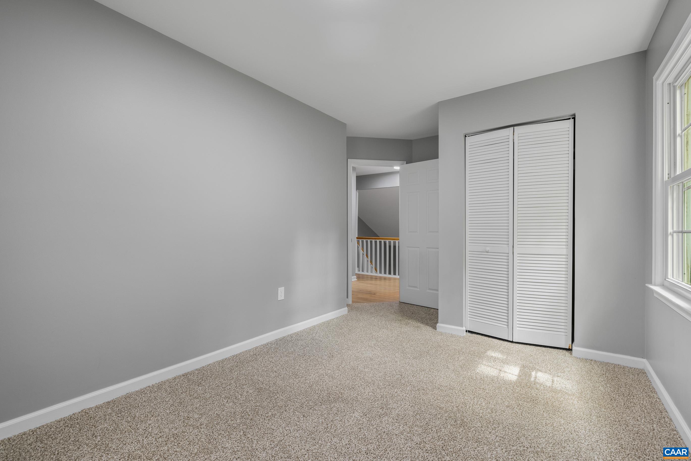 440 Carnation Road Ruckersville, VA 22968 - Photo 33 of 44 an empty room with closet area