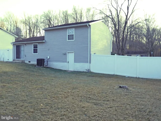 a view of a house with a trees