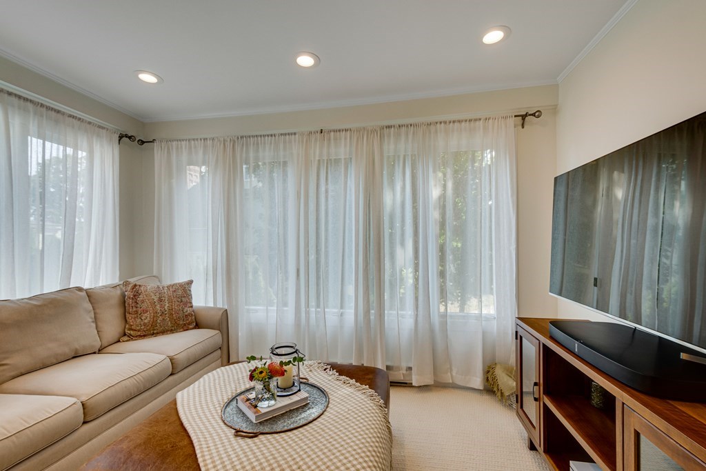 33 Ashcroft Road Medford, MA 02155 - Photo 11 of 28 a living room with furniture and a large window