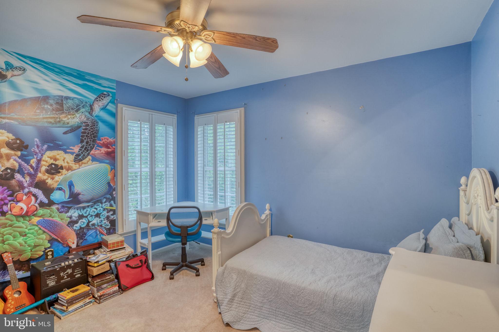 357 Willits Way Garnet Valley, PA 19060 - Photo 43 of 63 a bed room with a bed and a chandelier