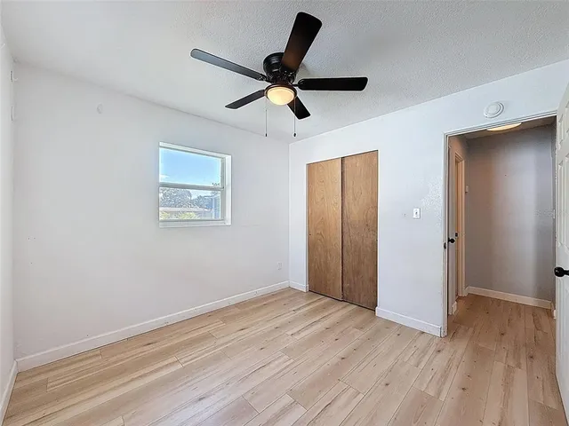 a view of a room with porch and wooden floor
