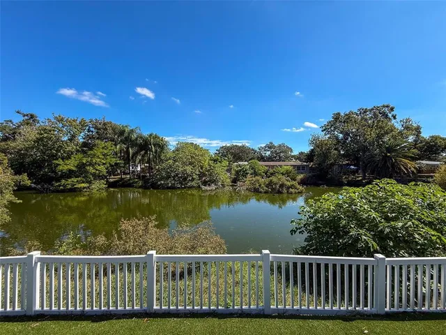 an aerial view of a house with a garden