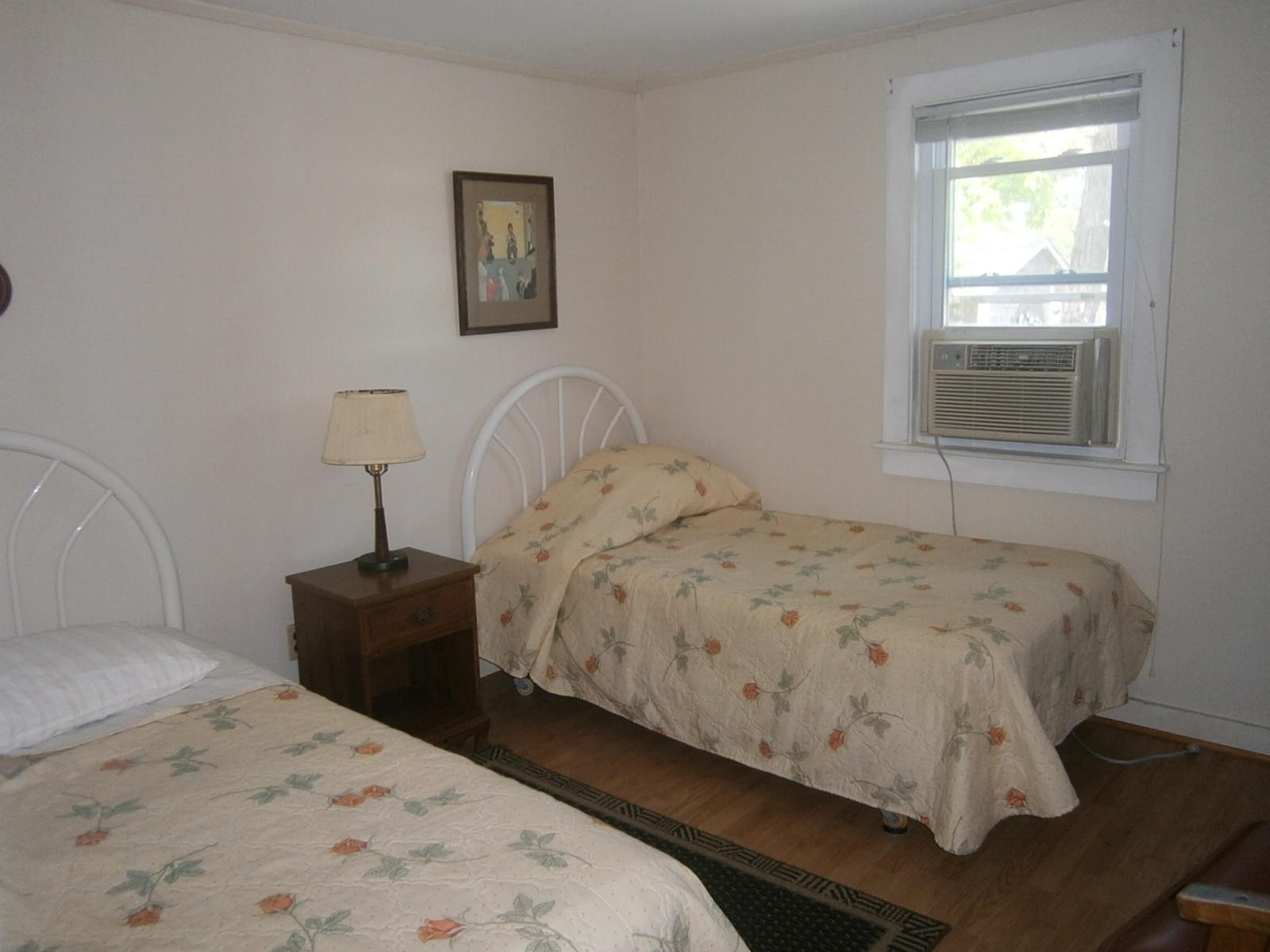 189 Captain Chase Road Dennis Port, MA 02639 - Photo 16 of 21 a bedroom with a bed and window