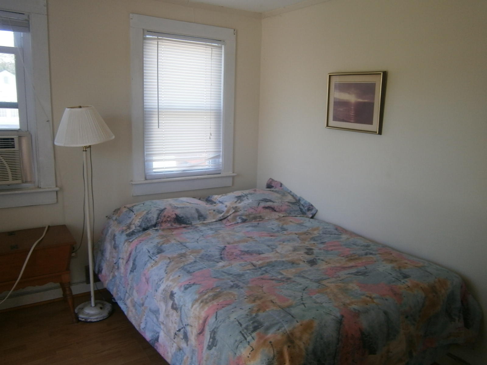 189 Captain Chase Road Dennis Port, MA 02639 - Photo 17 of 21 a bedroom with a bed and a window