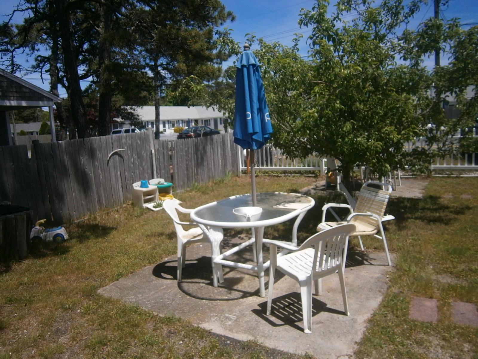 189 Captain Chase Road Dennis Port, MA 02639 - Photo 5 of 21 a table and chairs with the view of outdoor space